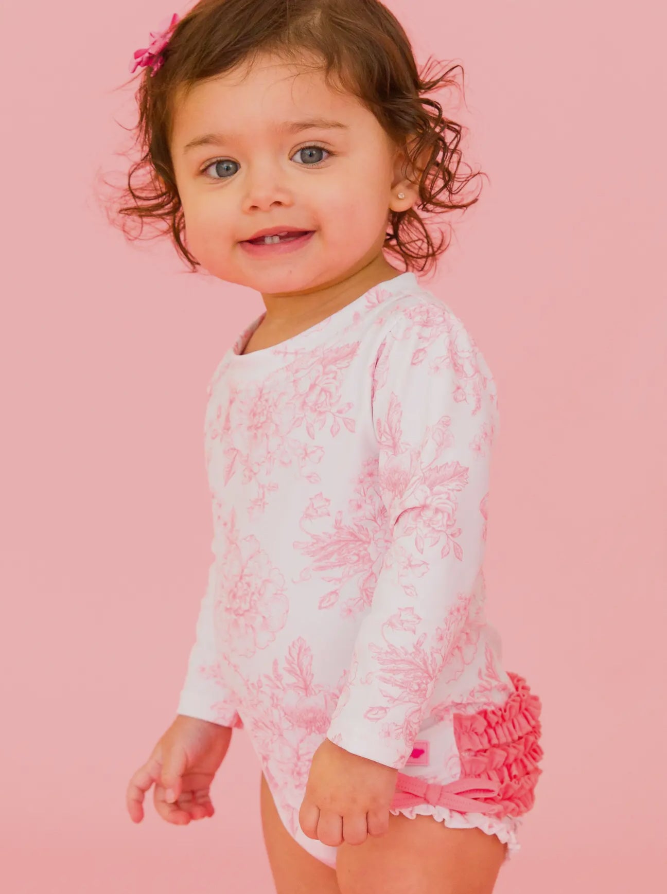RuffleButts + RuggedButts - Pink Garden Toile Long Sleeve One Piece Rash Guard