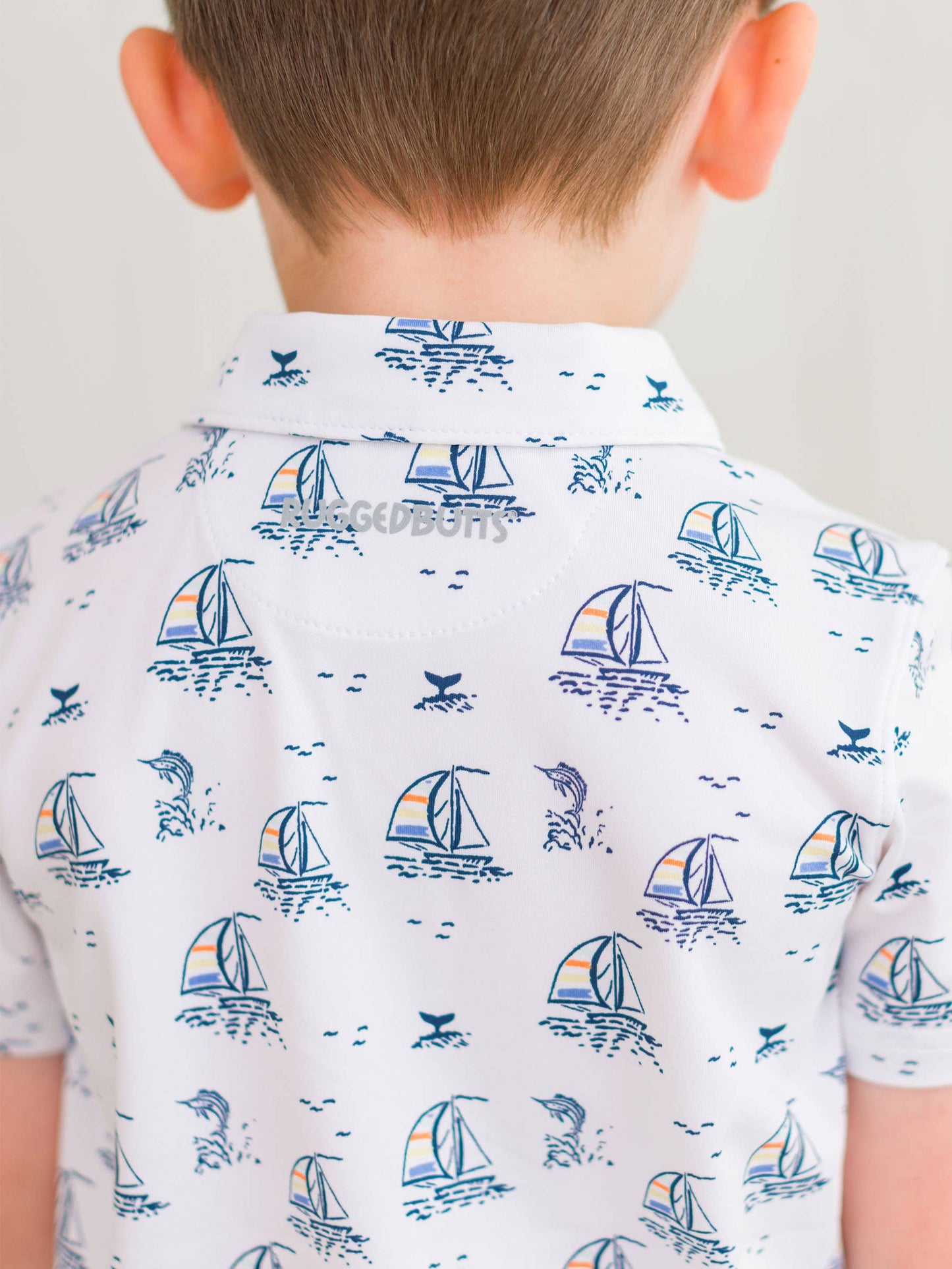 RuffleButts + RuggedButts - Boys Sailing the Seas Knit Short Sleeve Performance Polo