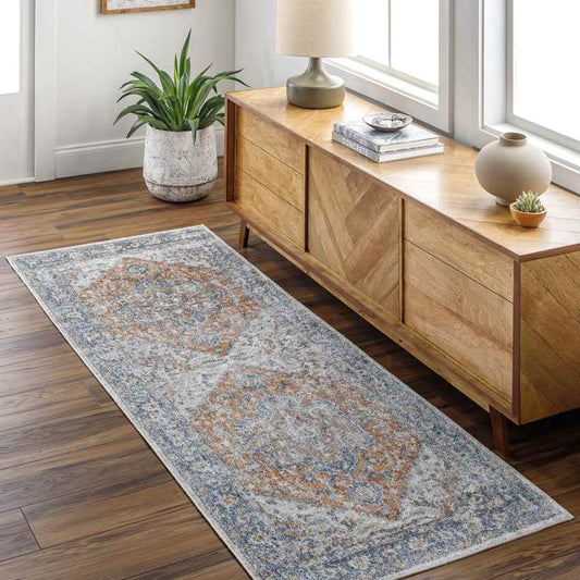 Estill Traditional Burnt Orange Washable Area Rug