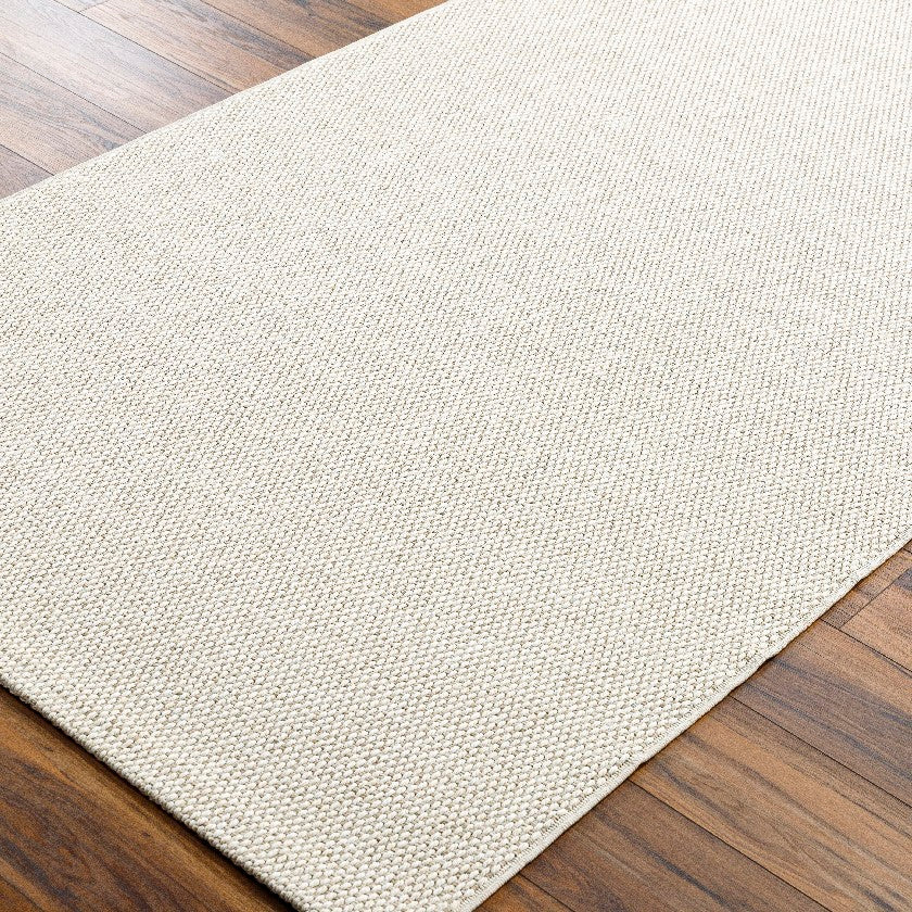 Nalani Solid and Border Pearl Area Rug