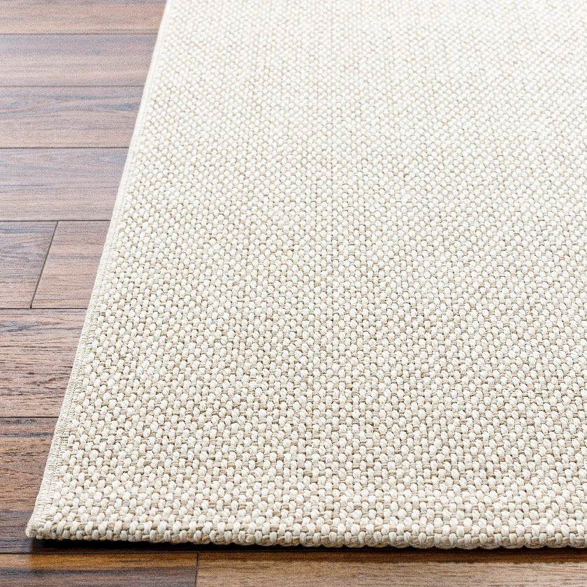 Nalani Solid and Border Pearl Area Rug