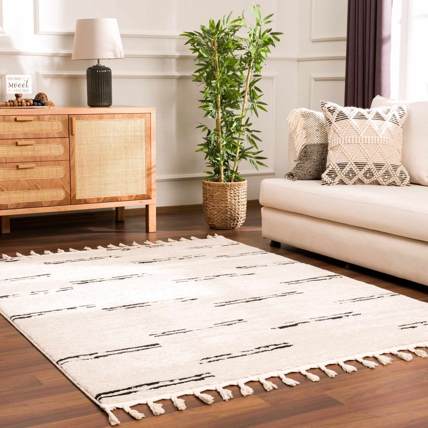 Riad Black Striped White Area Rug with tassels