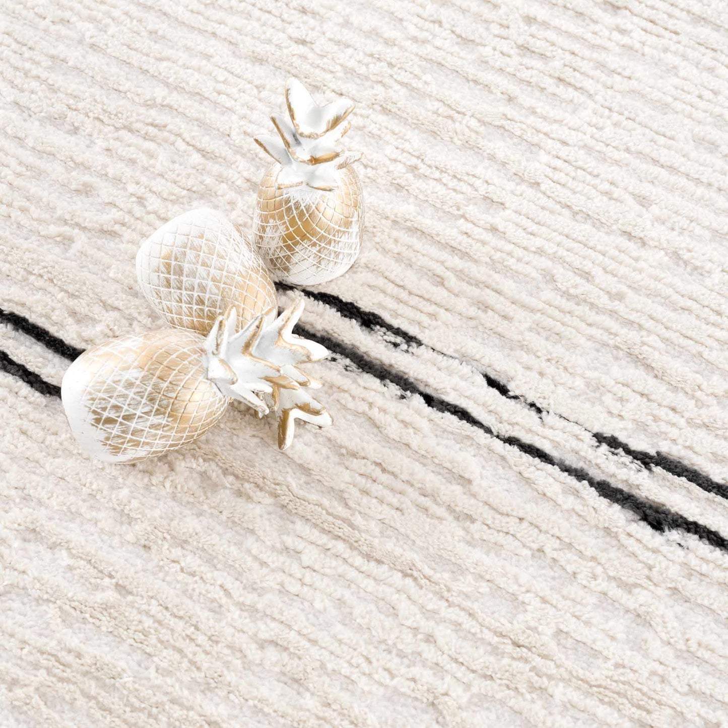 Riad Black Striped White Area Rug with tassels