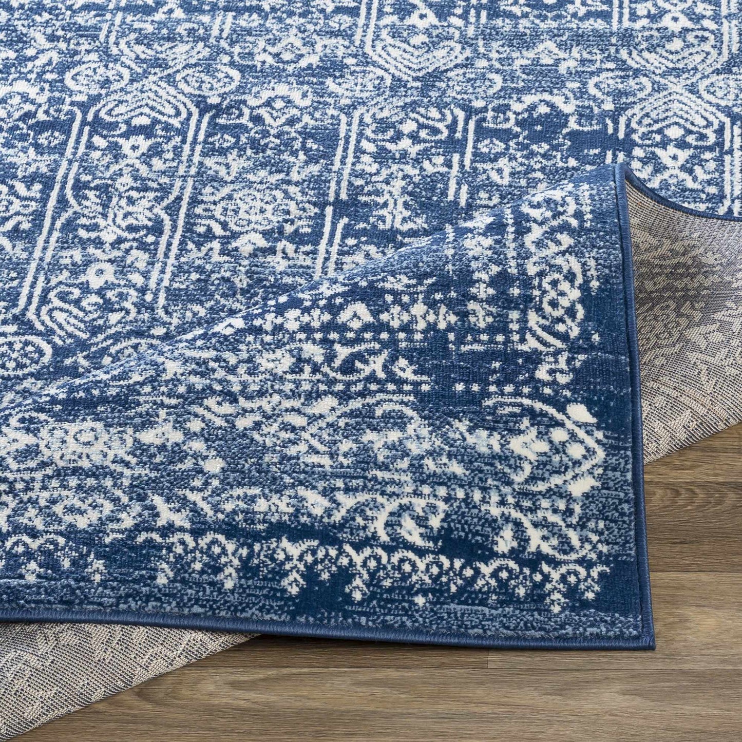 Michie Dark Blue Area Rug - Clearance