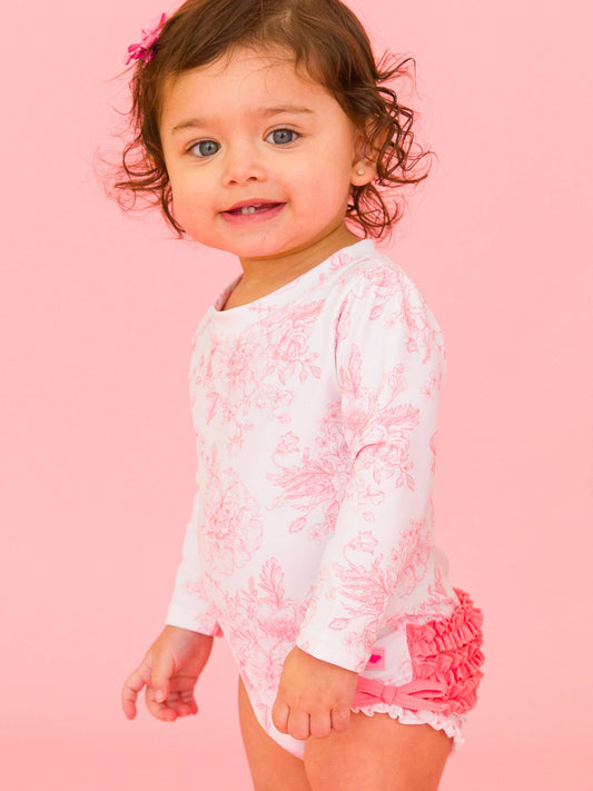 RuffleButts + RuggedButts - Baby Girls Bubblegum Pink Butterfly Garden Toile One Piece Rash Guard