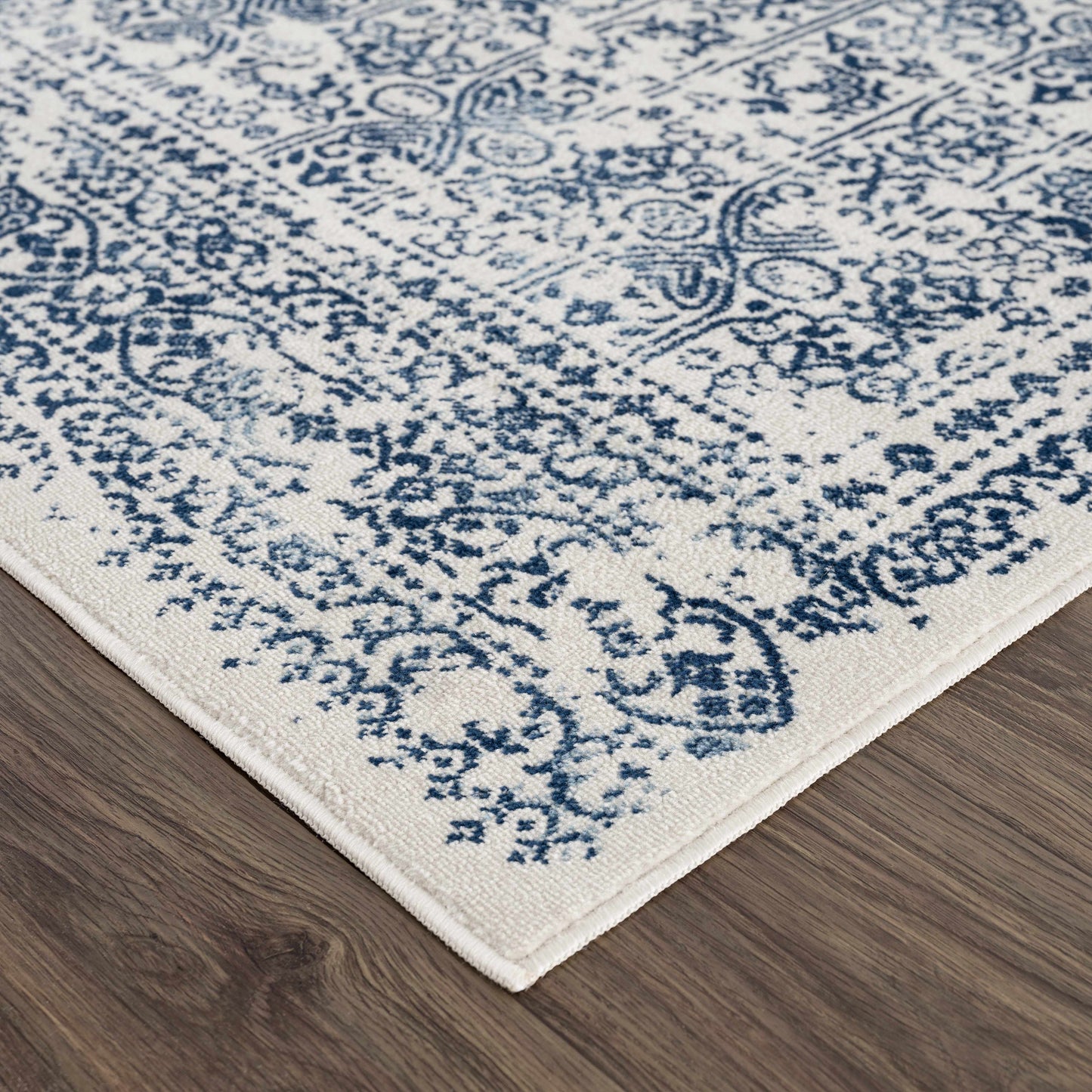 Michie Blue Area Rug - Clearance